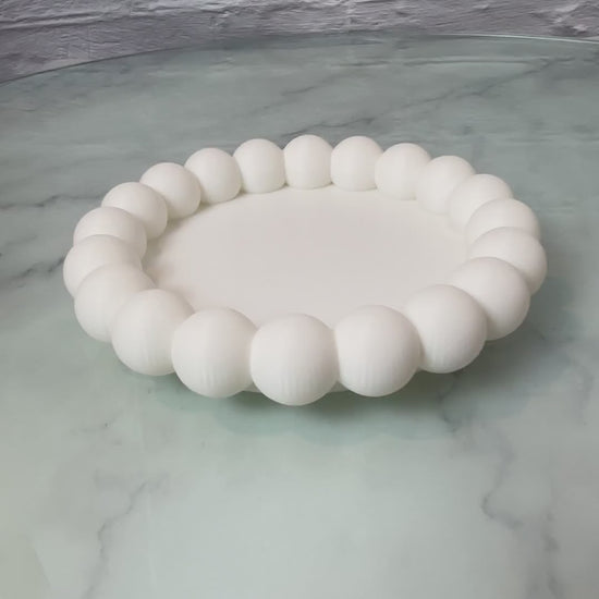 Vide-poche à bulles en vidéo